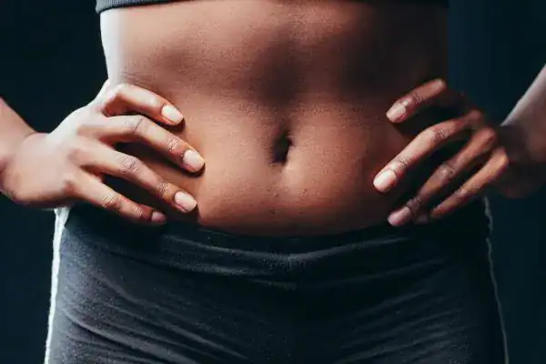 Toning Your Stomach: The Ultimate Guide to Achieving a Sculpted Stomach While Shedding Pounds 1 Image of a toned stomach after non surgical treatment Cardiff